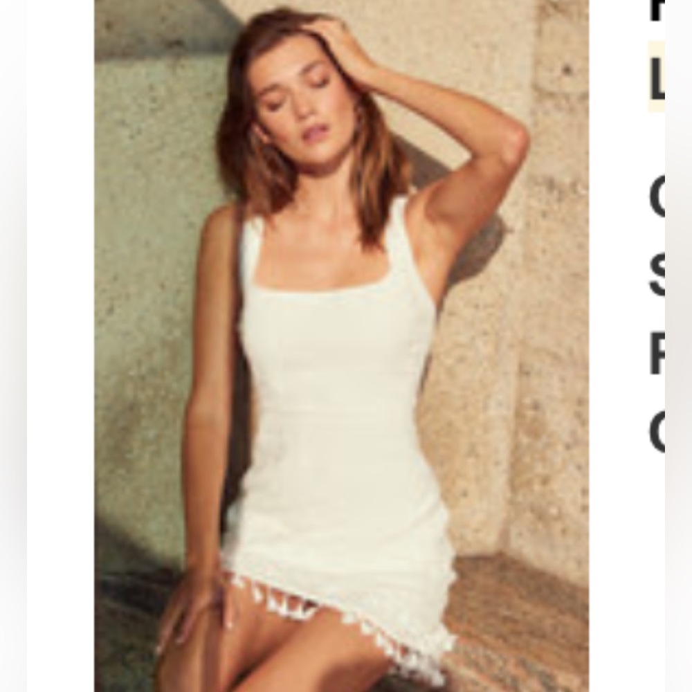 Lulu’s white dress with tassels